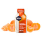 Mandarin Orange GU Energy Gel surrounded by segments of orange / mandarin.
